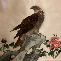 Vintage Chinese silk embroidery featuring an eagle perched on a rock amidst flowering peonies. 