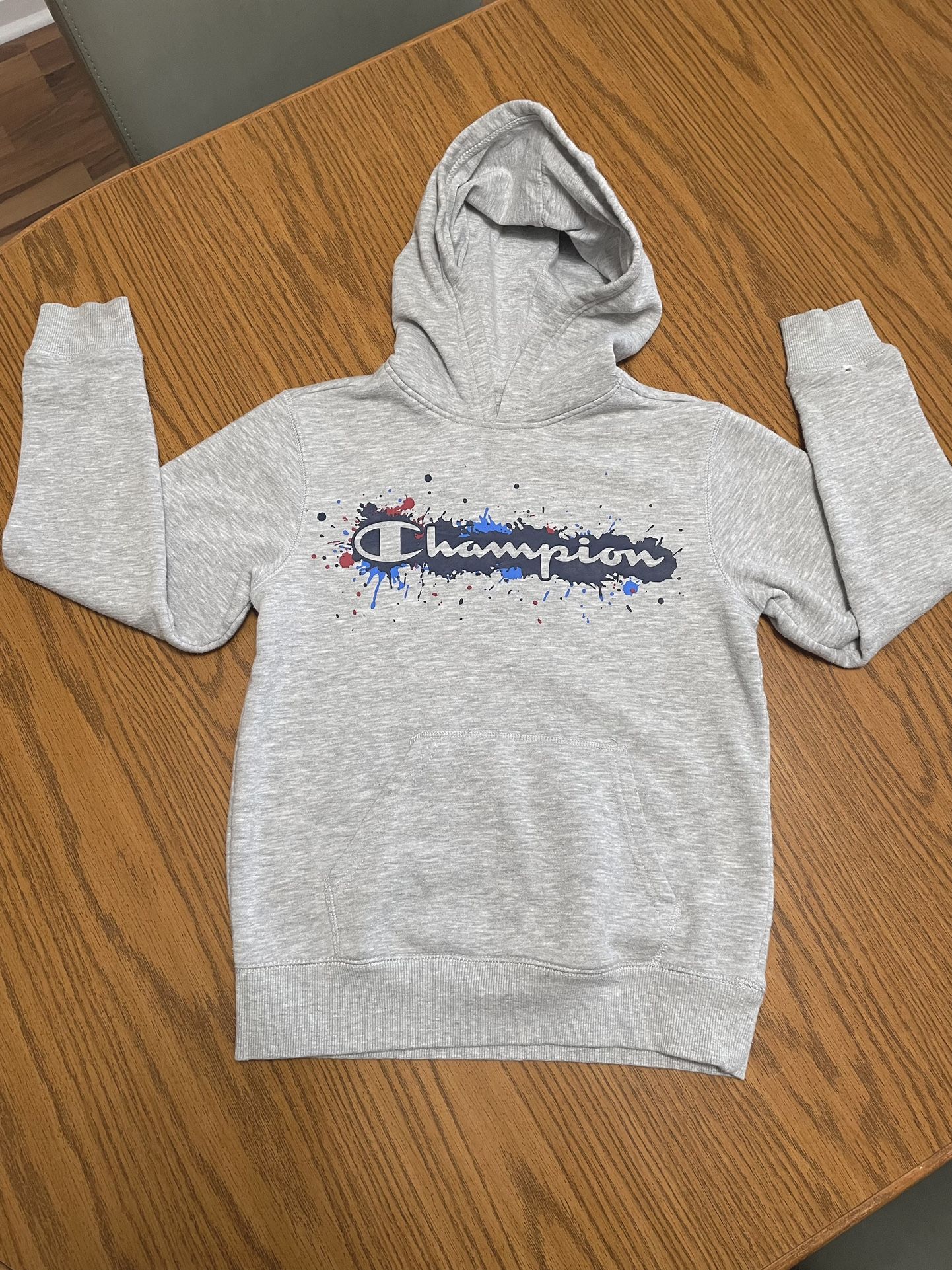 Used Gray Youth M Champion Sweatshirt with hood and front pocket. More Below.