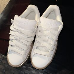 White Fenty Pumas 