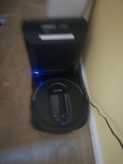 Shark robot vacuum with self empty bin