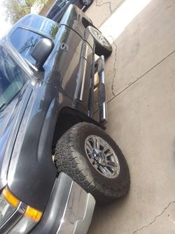 17 Inch (MB) Wheels & Tire Set Off A Lifted V8 Chevy 1500 Silverado