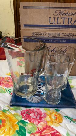 8 SMITHWICKS IRISH ALE 3 D RAISED LETTER SIGNATURE GLASSES AND A PITCHER