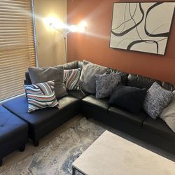 ALMOST NEW LEATHER FAUX COUCH 