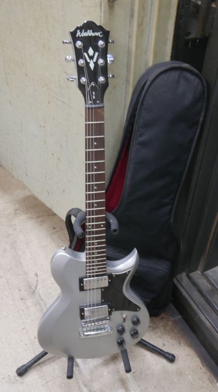 Washburn WI-64 Electric silver Guitar with soft case. used. tested. in a good working order.
