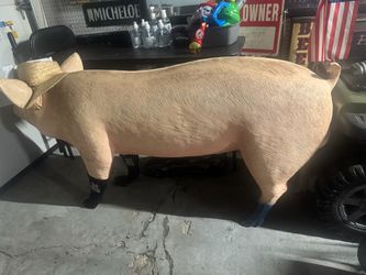 Pot belly pig statue