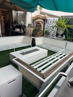 Beautiful aluminum patio set; cushions not included; fire pit not included.