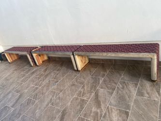 Heavy wood benches upholstered