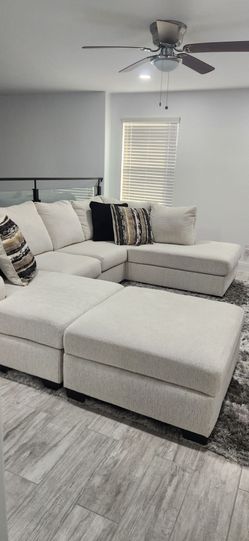 Large Cream Fabric Sectional Sofa with Ottoman