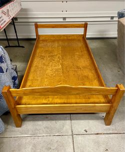 Wood twin bed and mattress