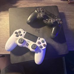 PlayStation 4  Slim And Two Controllers