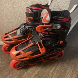 Adjustable Red & Black Rollerblades – Youth Size 3–6 – Used