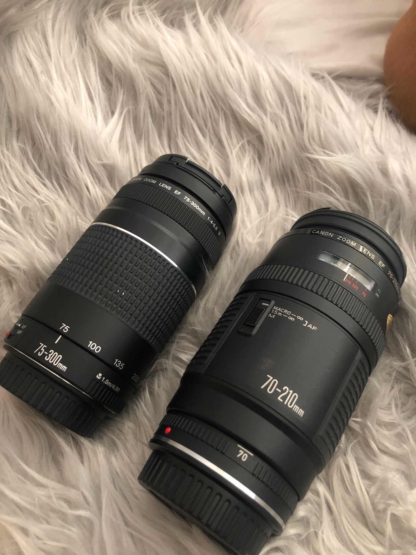 Two Canon lenses 75-300 mm 1:4-5:6 & 70-210 mm 1:4 professional lenses. Great condition! Very well taken care of.