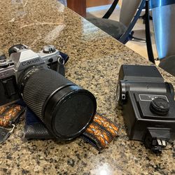 Cannon AE 1 with macro lens and vivitar photo flash