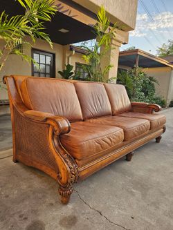 Hancock and Moore Carved Wood and Leather Sofa