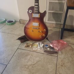 Very Nice Guitar And It's Accessories 
