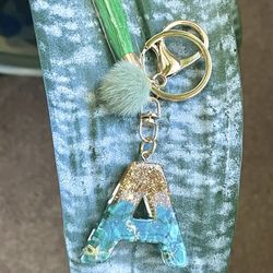 New Letter Alphabet Keychain Crystal Resin  (Nuevo).  NO TRADES.   NO SHIPPING.  (EAST PALMDALE).  FINAL SELL