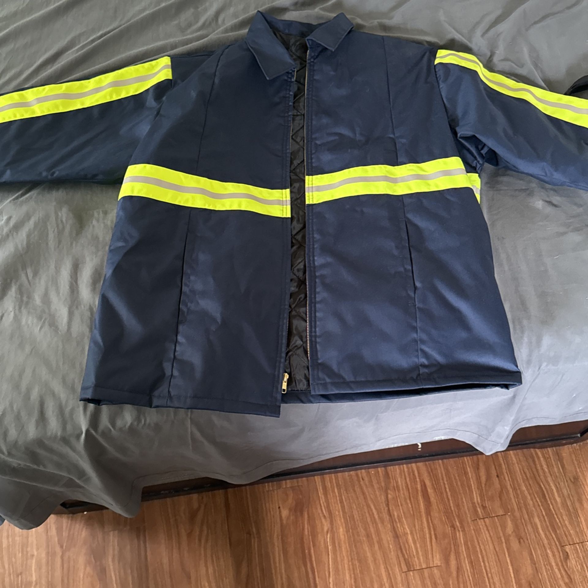 light reflecting jacket brand new. XL