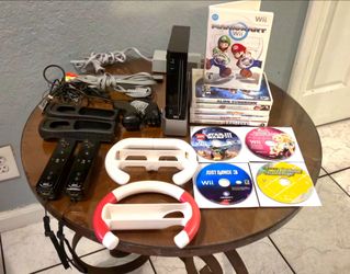 Nintendo Wii Console Bundle 10 Games, MotionPlus Controllers, Mario Kart w/ Racing Wheels