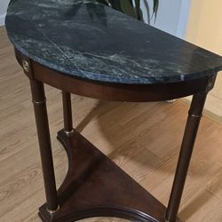 Solid marble and dark wood half moon console table
