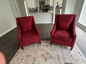 Red upholstered accent chairs