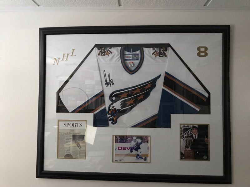 Autographed & Framed Alexander Ovechkin Rookie Jersey! Contains 3 Great 8x 10 Photos from his Rookie Season, including Article on "How Great" 44" Hig