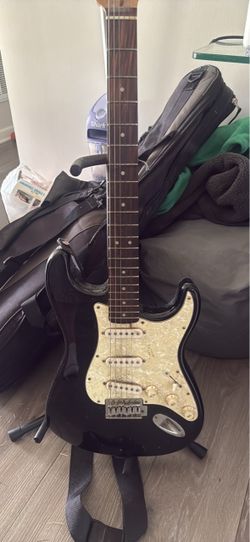 Black Stratocaster-Style Electric Guitar