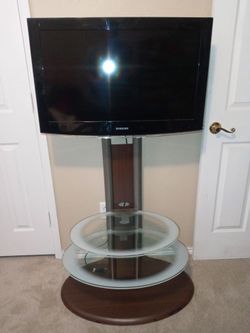 TV STAND WITH SAMSUNG TV  INCLUDED