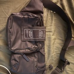 Woman’s Crossbody By bench