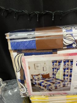 Bed Sheets And Window Curtains