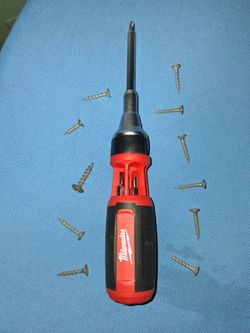New Milwaukee rachet screw driver with different bits firm price $25