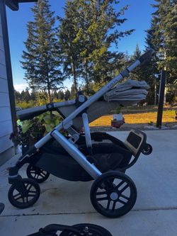 Uppa Baby Vista Double Stroller with piggy back, snack tray and brown leather attachments