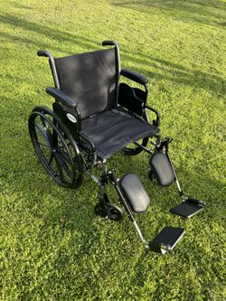 Wheelchair With Leg Rests