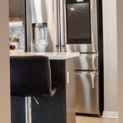 Samsung stainless steel French door refrigerator w/built-in touchscreen panel