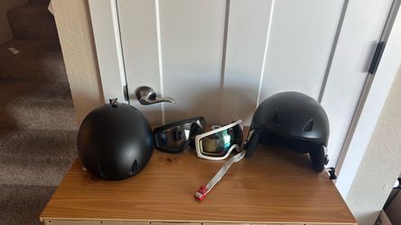 Ski helmets and goggles