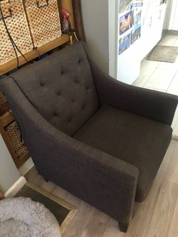 Gray Chair barely used. Gray cloth fabric.