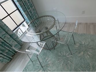 Glass table with 4 chairs