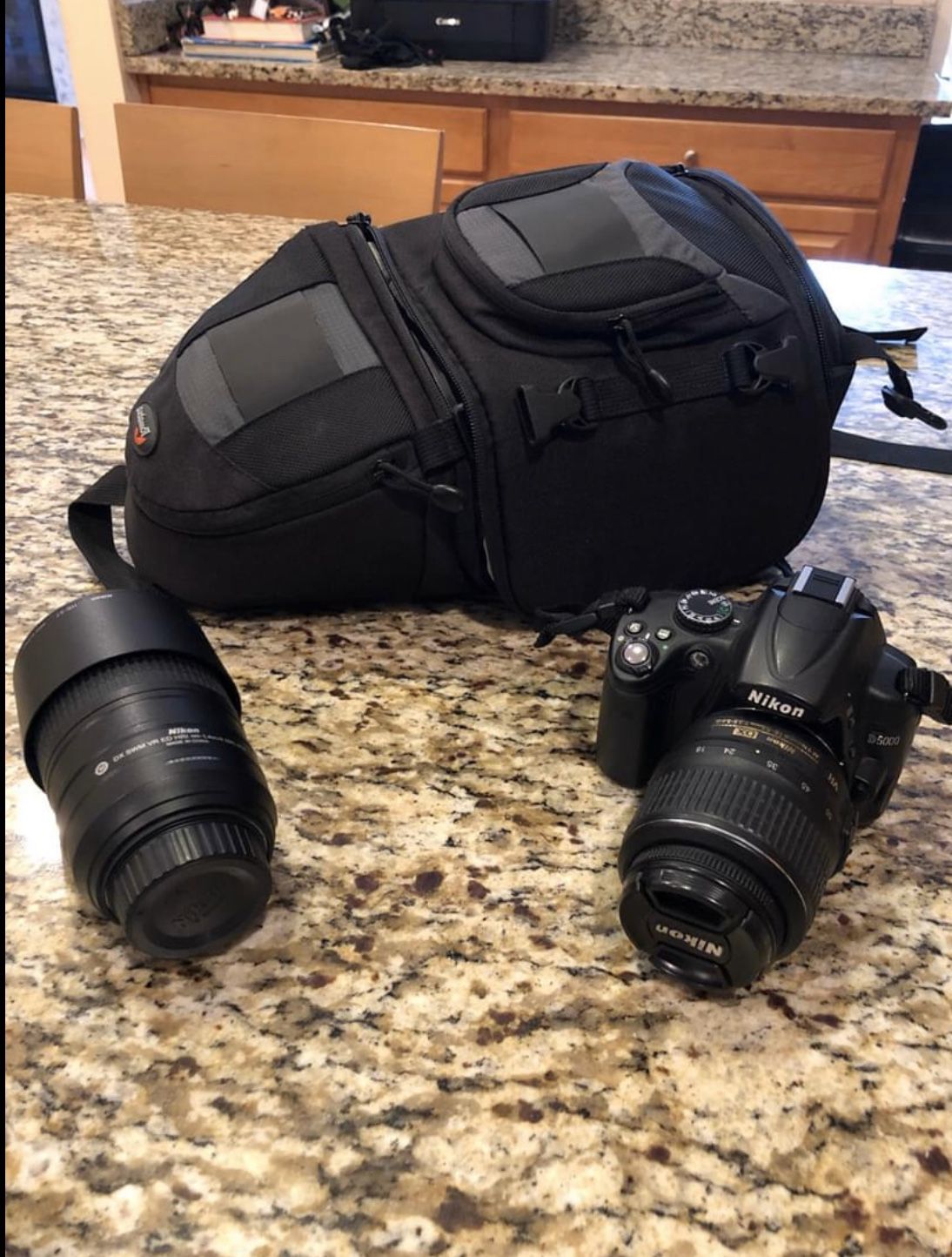 Nikon D5000 with 2 lenses and backpack