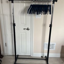 Adjustable Single Rod With Blue Velvet Hangers 