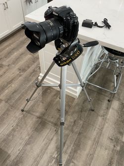 Nikon D300 Digital Camera with DX lense (AF-S NIKKOR 18-200mm), with adjustable Tripod, Battery and Charger, In Excellent Condition and Works Perfect.