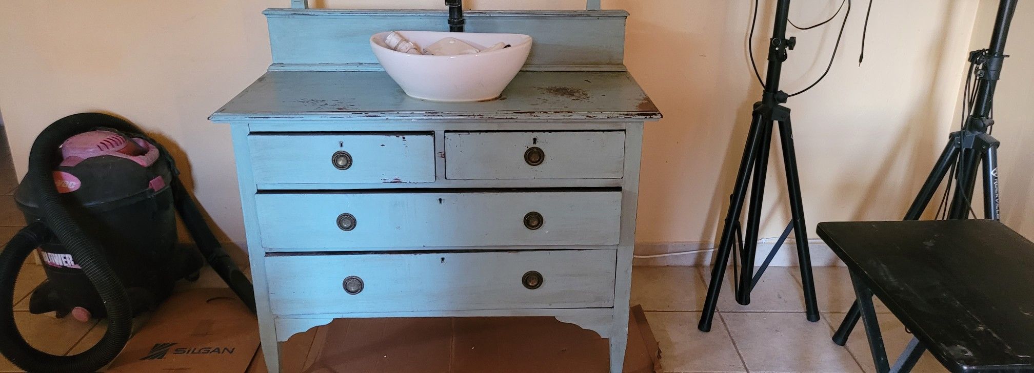 Bathroom Wooden Dresser Sink And Oval Mirror And. a glass. Tv Stand.