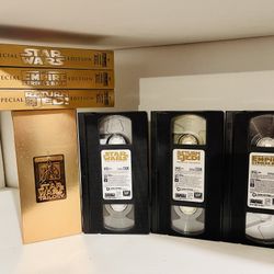 Mixed DVD And Cassettes Movies Of Star Wars.