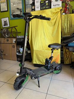 KOOMAMBA E. SCOTER 1200W 52V 20Ah-35MPH -RANGE 50MILES-OFF ROAD 10” TIRES-CAP.390LBS.