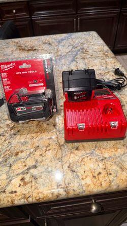 Milwaukee M18 XC5.0 Batteries & charger brand new