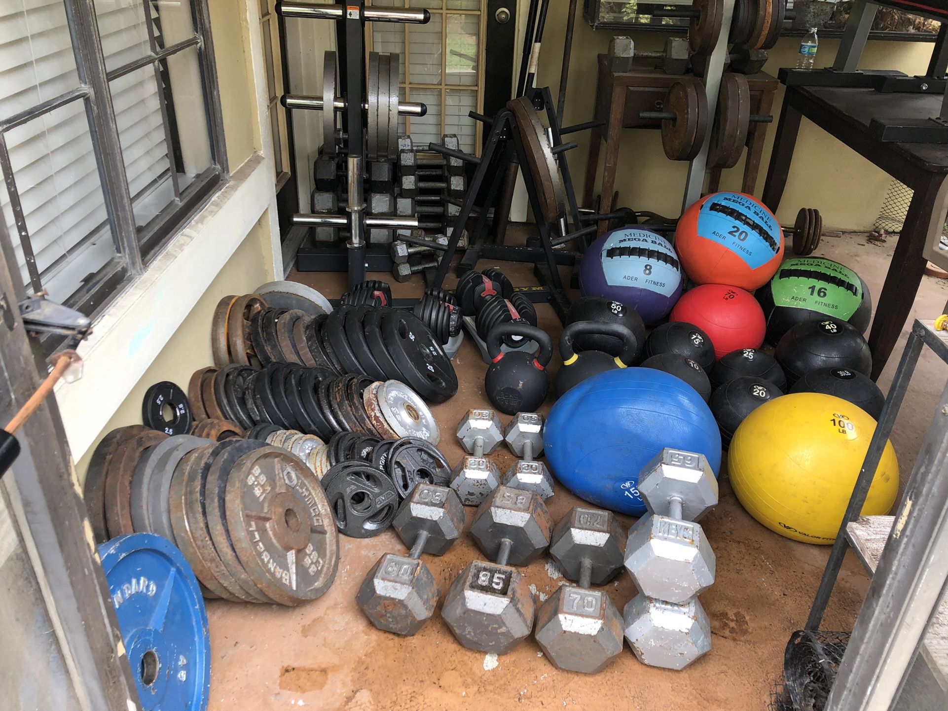 Huge Gym Lot! Bars Plates Dumbells Benches And More!