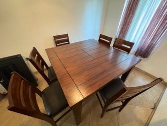 Brown wooden table with 6 chair set