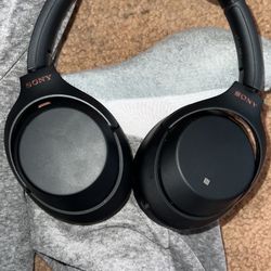 Rose Gold, And Black Sony Headphones