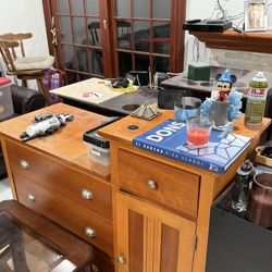 Cherry/chestnut Wood color and Black Dresser
