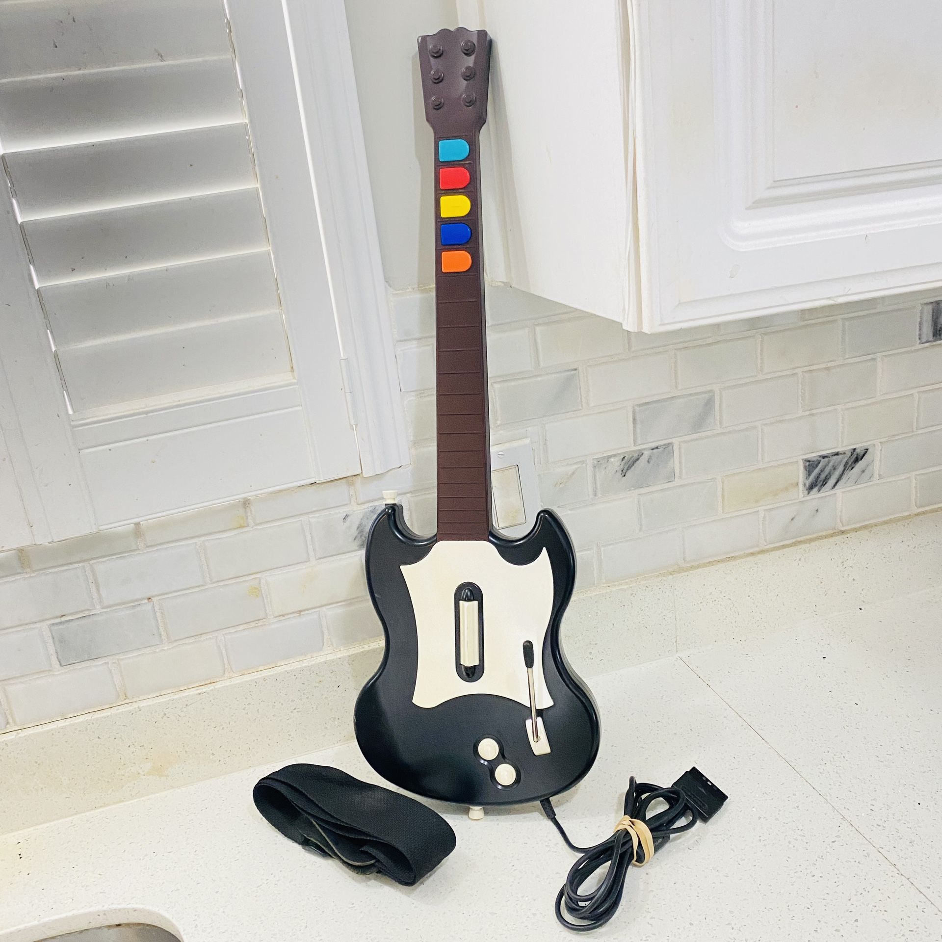 Playstation 2 RedOctane Guitar Hero Black Wired Controller PSLGH with shoulder Strap. Tested and Works Great.