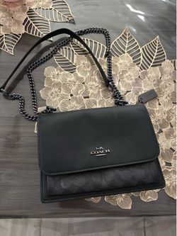 Black coach bag.