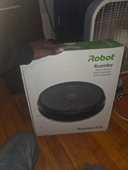 Brand new romba robot never opened